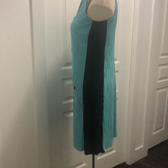 Teal with a black stripes down the sides - Picture 2 of 3